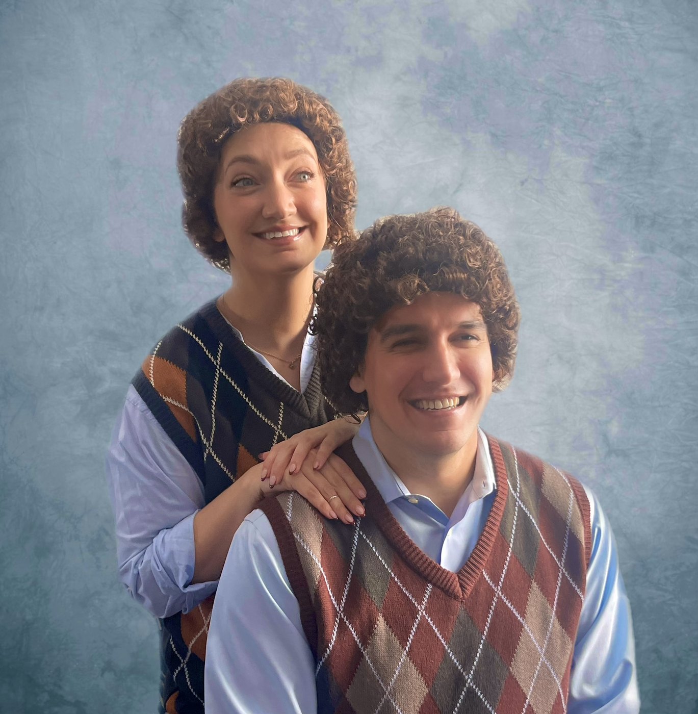 Michael and Alyssa wearing matching retro costumes
